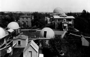 A black and white photograph of Harvard College Observatory in 1899.