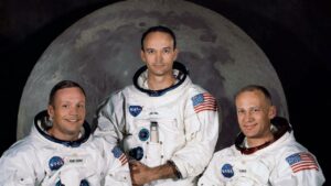 The crew of the Apollo 11 Mission pictured in front of the Moon: Commander Neil Armstrong, Command Module Pilot Michael Collins and Lunar Module Pilot Edwin “Buzz” Aldrin