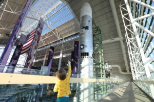 A guest enjoying Evergreen Aviation & Space Museum's Titan II SLV exhibit.